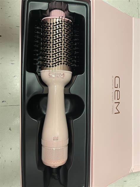 Save on styling time and get voluminous hair using a hot air brush. . Gem hot air brush